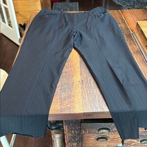 Oscar de la Renta Black pin striped pants.